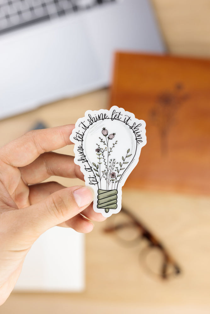 LET IT SHINE · Transparent Sticker - Damrell Designs